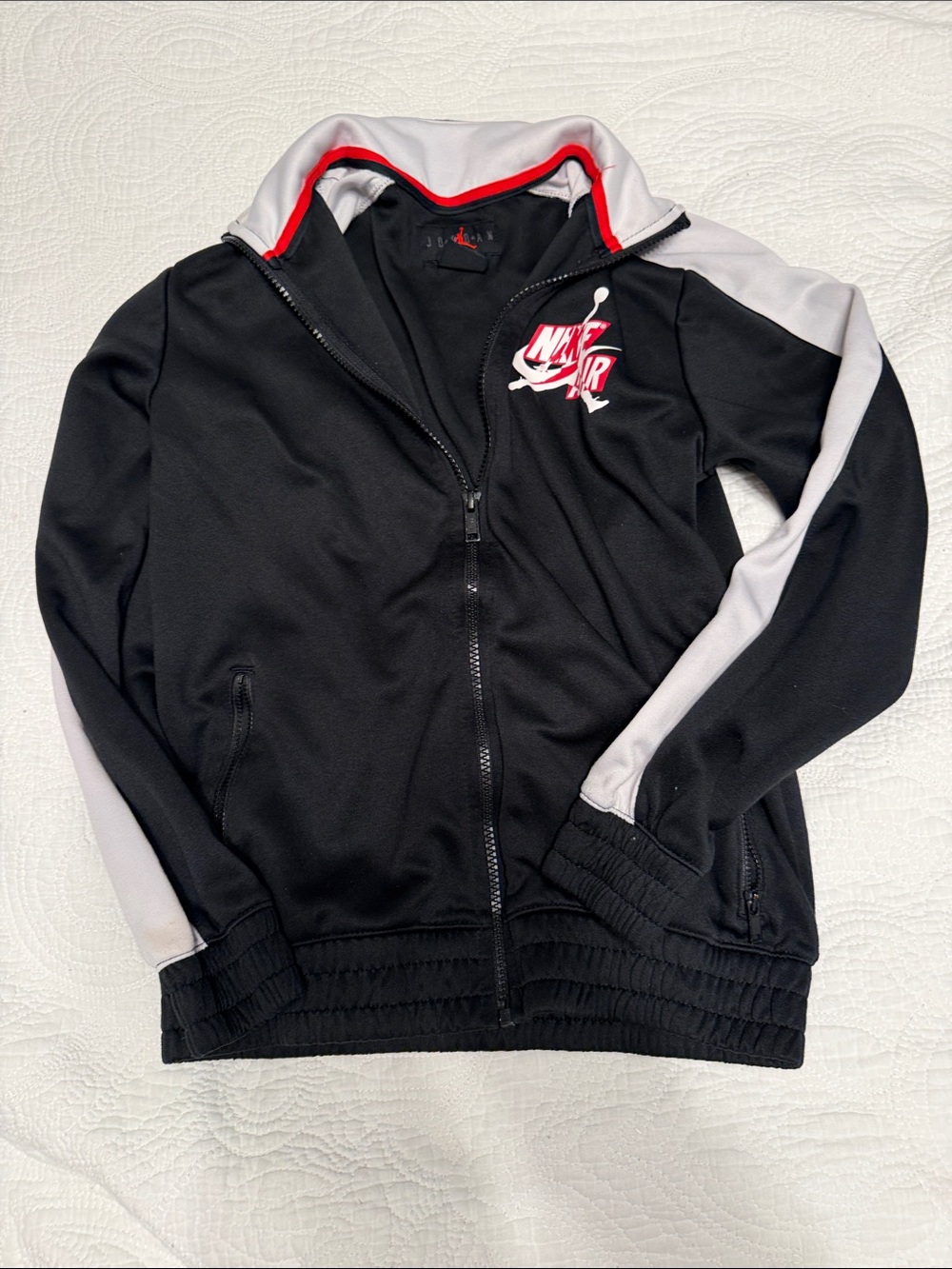 Nike Air Black Track Jacket with Gray Sleeves and Red Trim